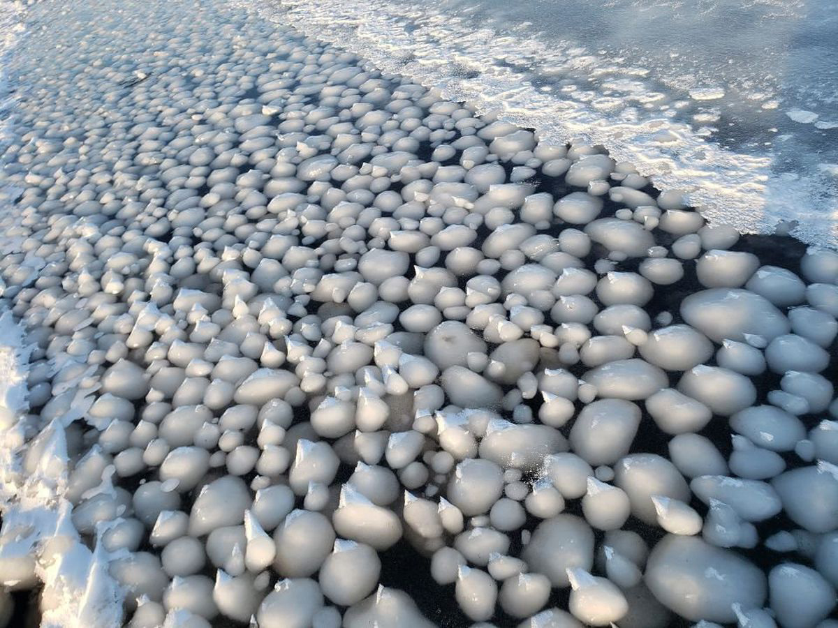 Ice balls on the banks of the Wulik River near Kivalina, Alaska. The NWS Alaska-Pacific River Forecast Center said they suspected a combination of strong waves and super cold water created these ice balls.