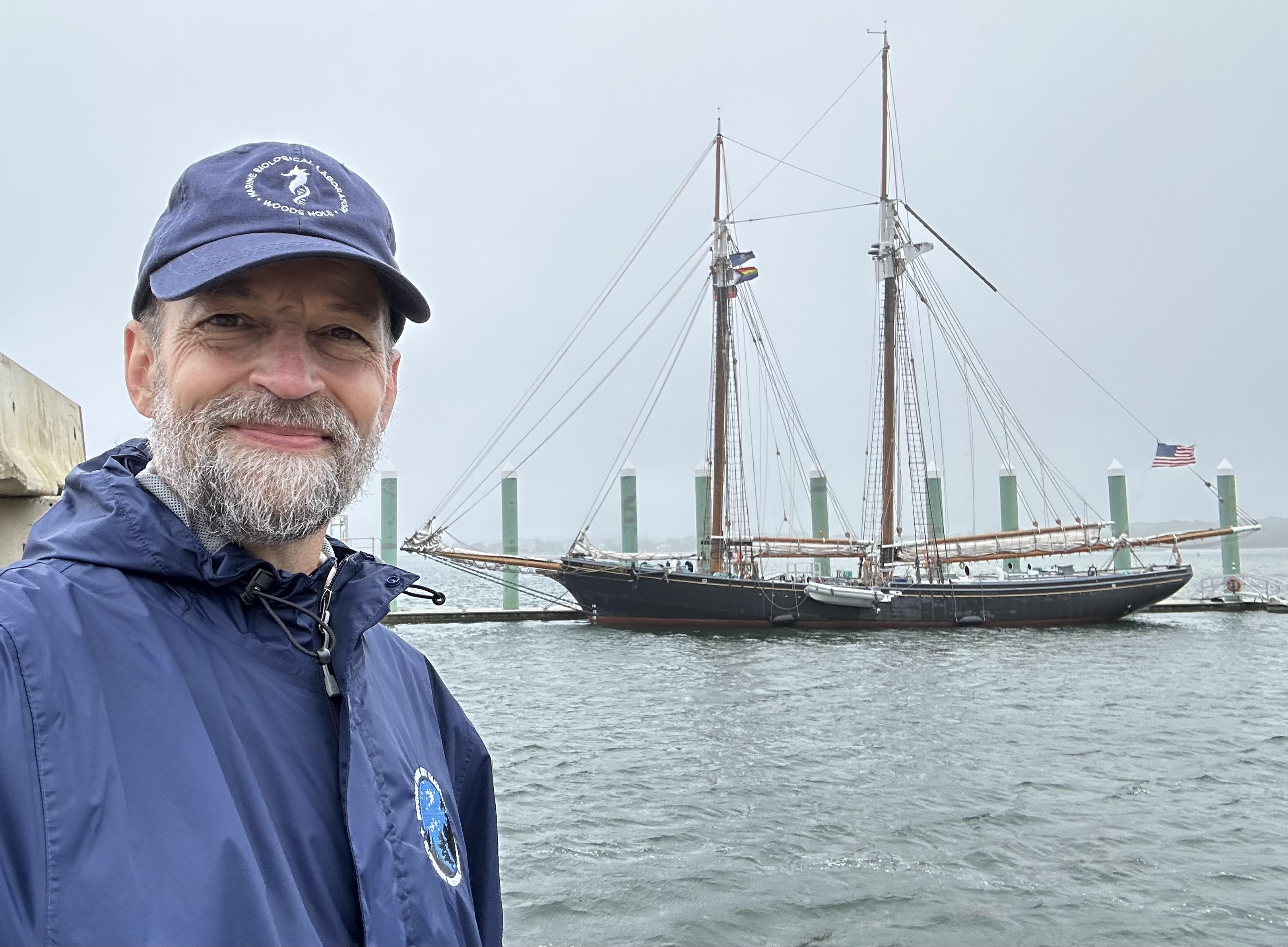 Erik Simula stands in front of the Schooner Ernestina Morrissey at the Massachusetts Maritime Academy