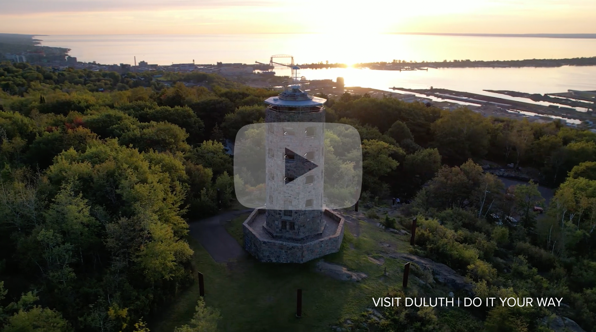 aerial view of tower with water in the background
