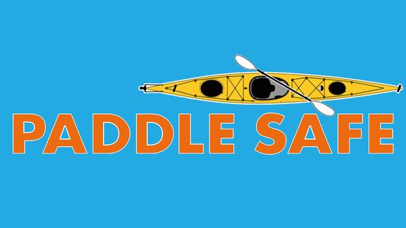 graphic of the top of a yellow kayak with words Paddle Safe