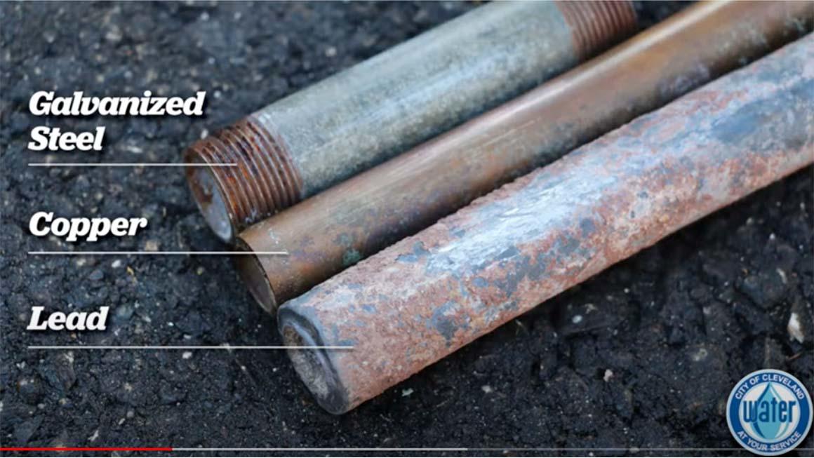 Three pipe ends. One galvanized steel, one copper, one lead