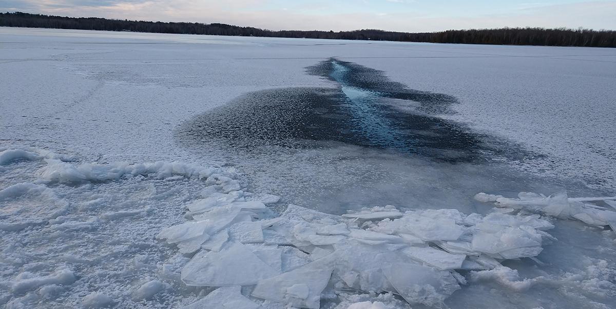 Partially frozen plate ice on a lake