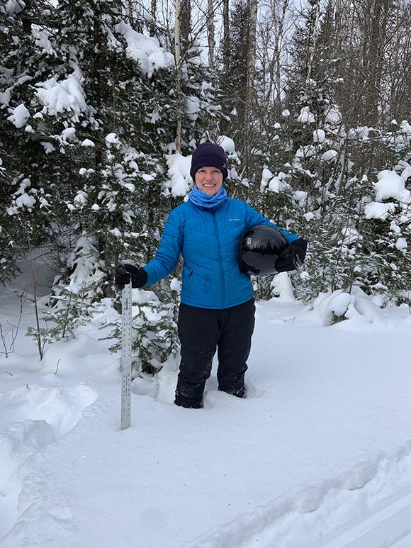 1854 Treaty Authority Climate Biologist Hilarie Sorensen conducting snow depth monitoring at Stone Lake in February 2022.
