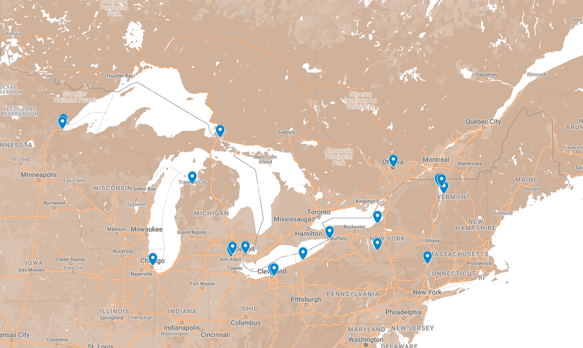 Graphic map of Great Lakes showing blue pins at locations of HazMaTon members 