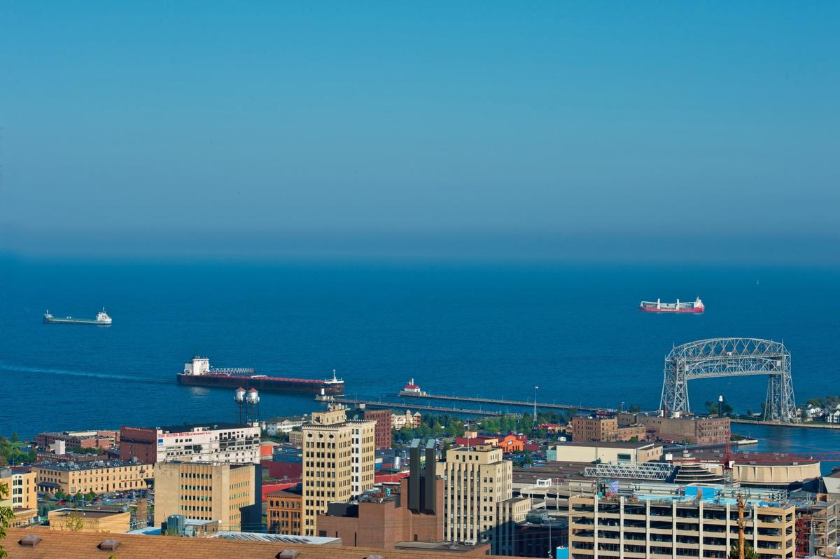 Aerial view overlooking three ships sailing Lake Superior near Canal Park in Duluth, Minnesota.