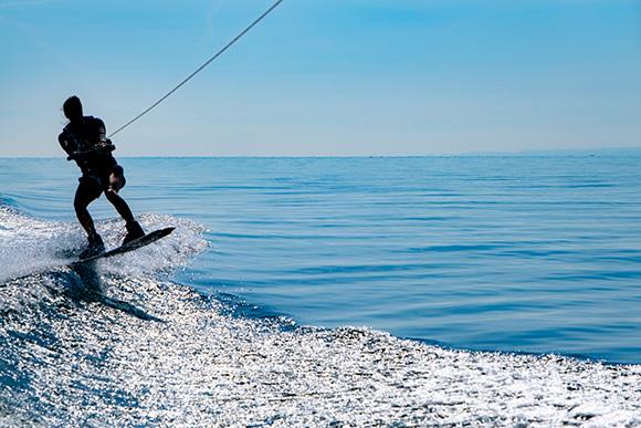 Person wakeboarding on water.